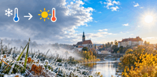 Vom Frost zur Sonne über der Flussstadt